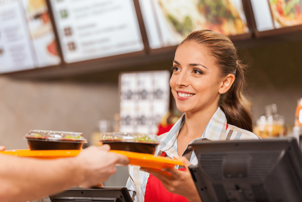 restaurant employee serves food