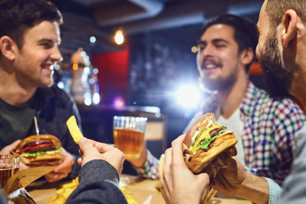 Customer retention strategies: friends eating at a restaurant